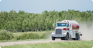 Co-op fuel truck traversing a highway
